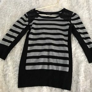 Amy Byer black and grey striped sweater.