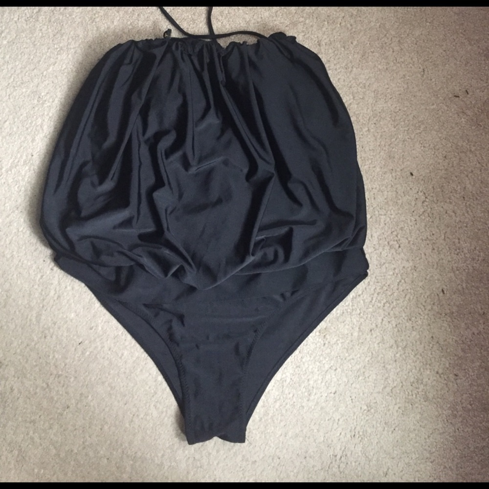 Like new xxl black one piece swimsuit covers well
