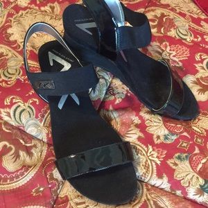 Black Anne Klein wedge sandals.