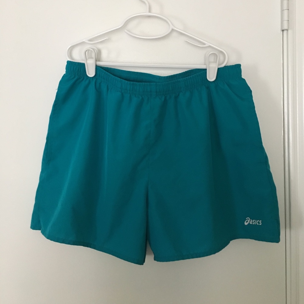 Teal pocketed running shorts