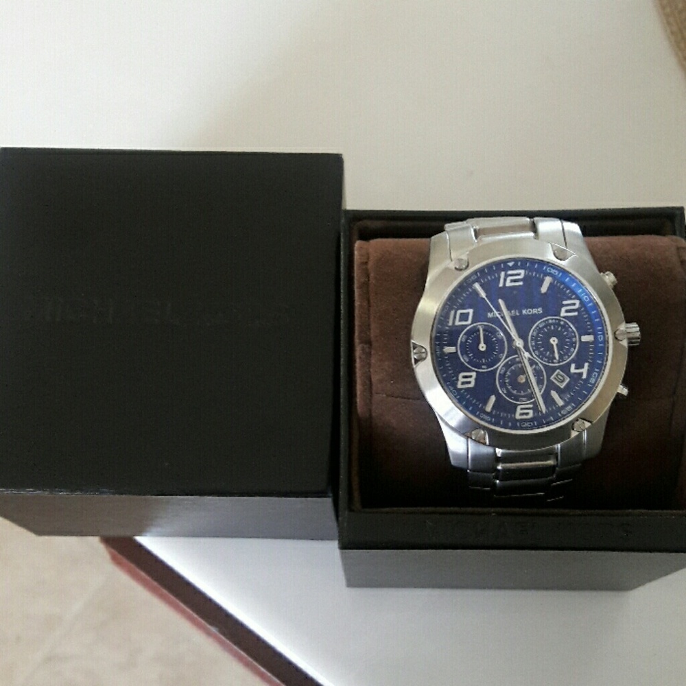 Michael Khors men's watch w/plastic still  on face