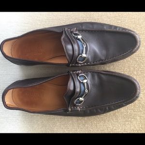 Brown Gucci loafers with buckle
