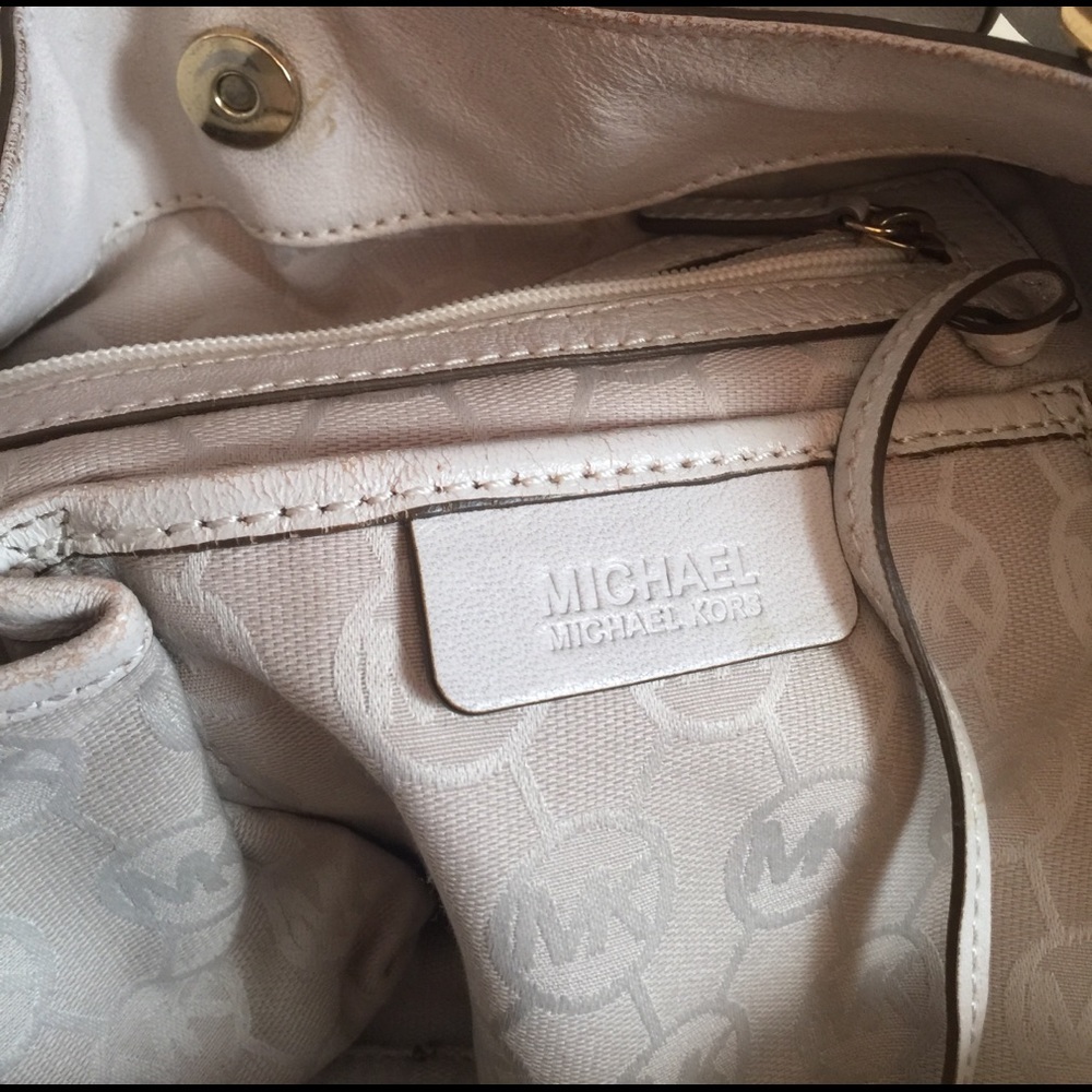 Authentic Michael Kors leather bag. Soiled
