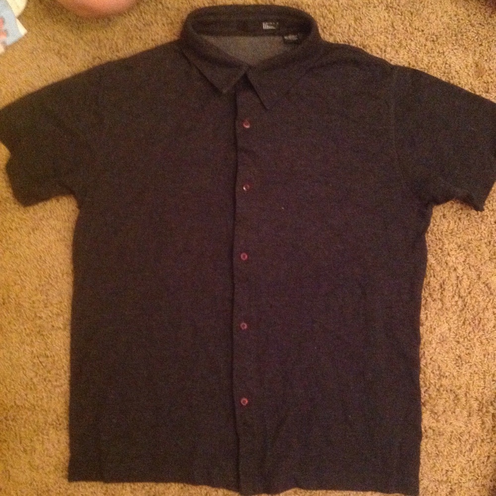 Button up grey collared shirt.
