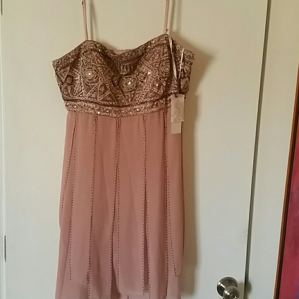 Dress size 14..fits like a 12