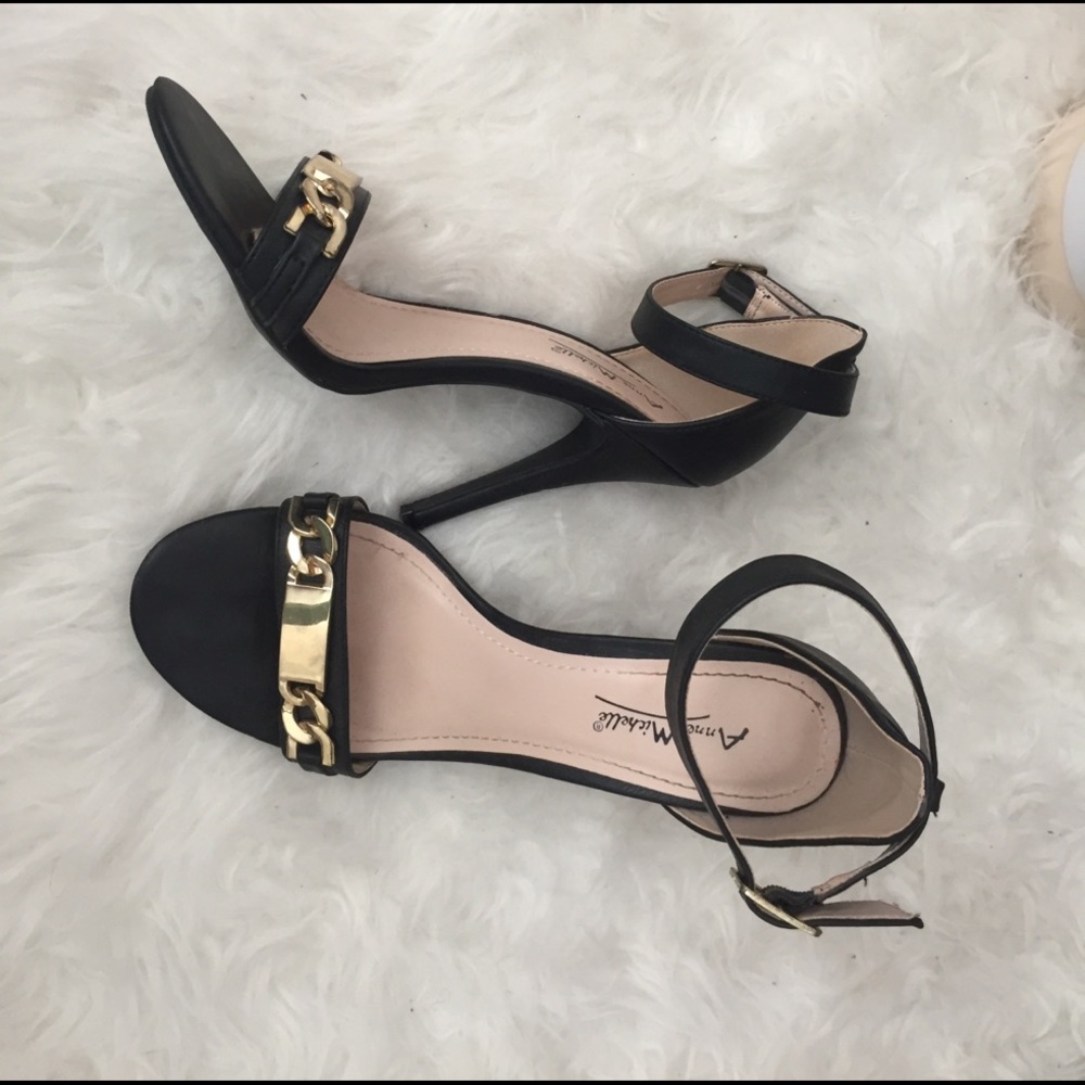 Black strappy heels with good detail