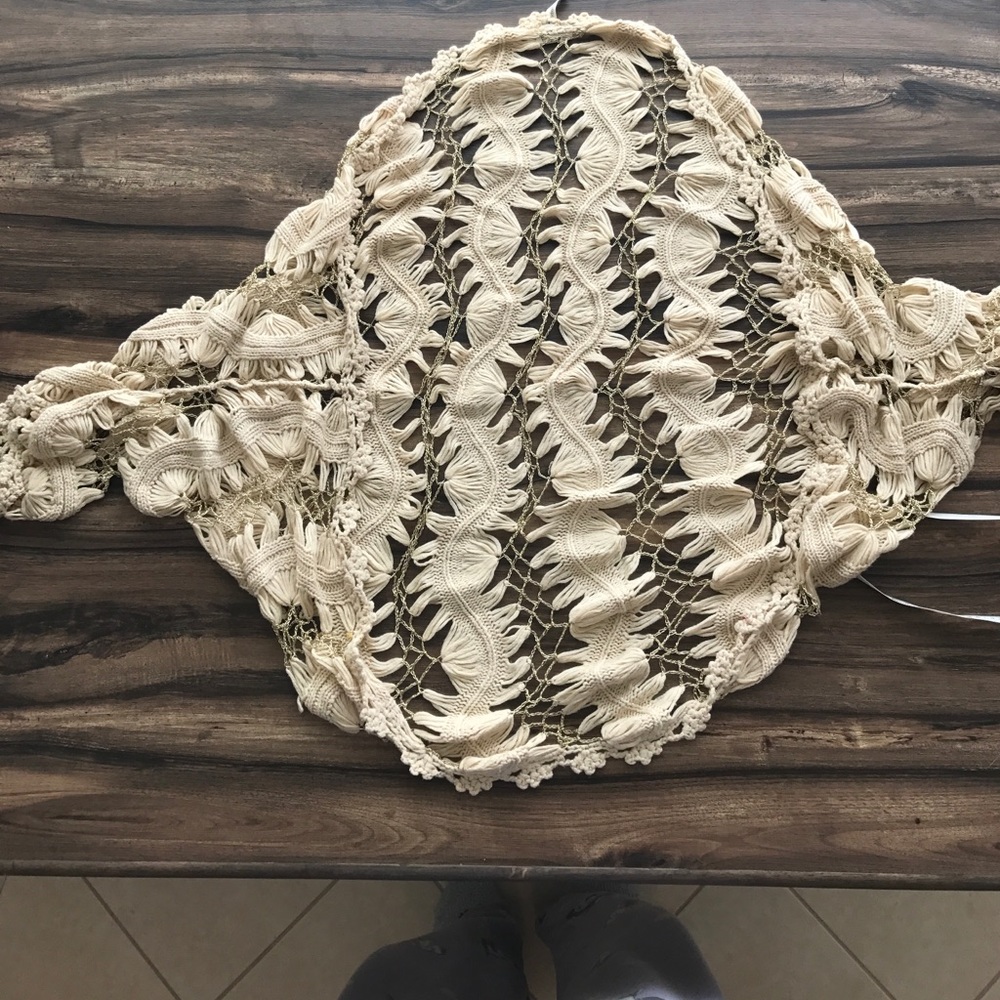 Delicate bohemian crocheted shrug
