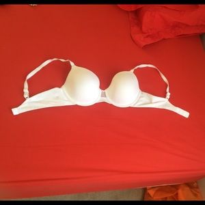 SOLD. White Vanity Fair 34c. Good quality.