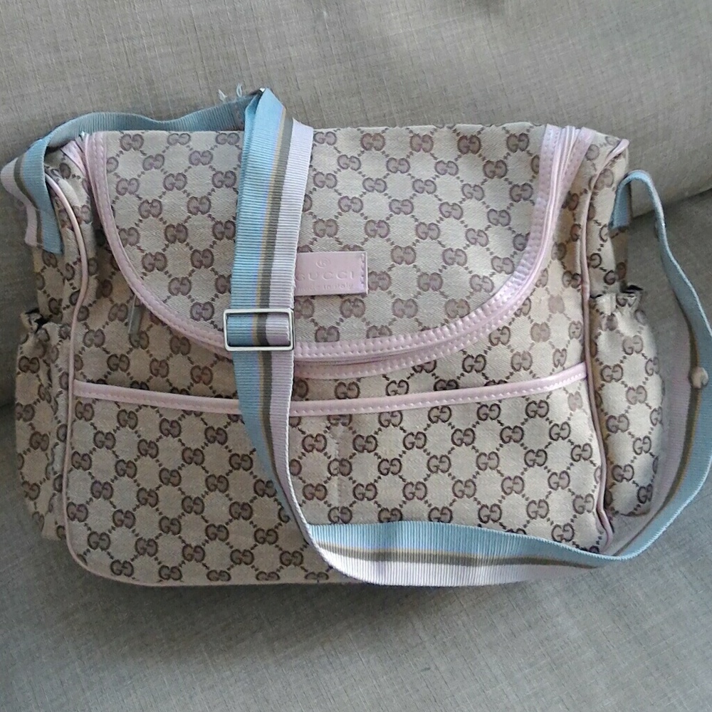 Pink trim Gucci diaper bag