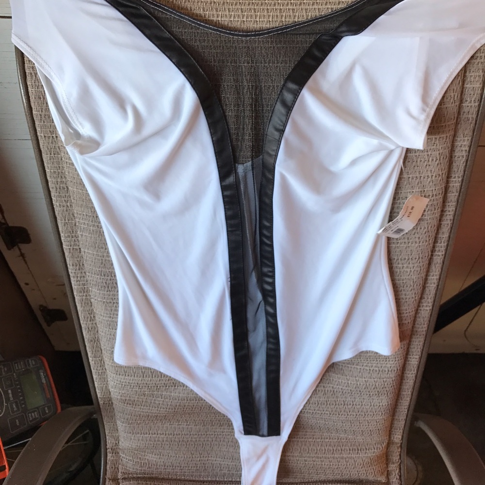 White body suit with mesh and faux leather trim
