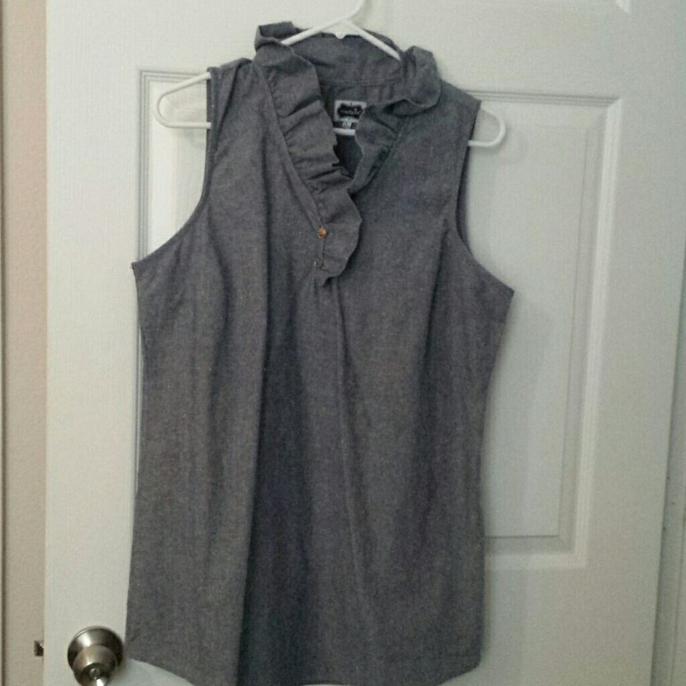 blue sleevess top with ruffles