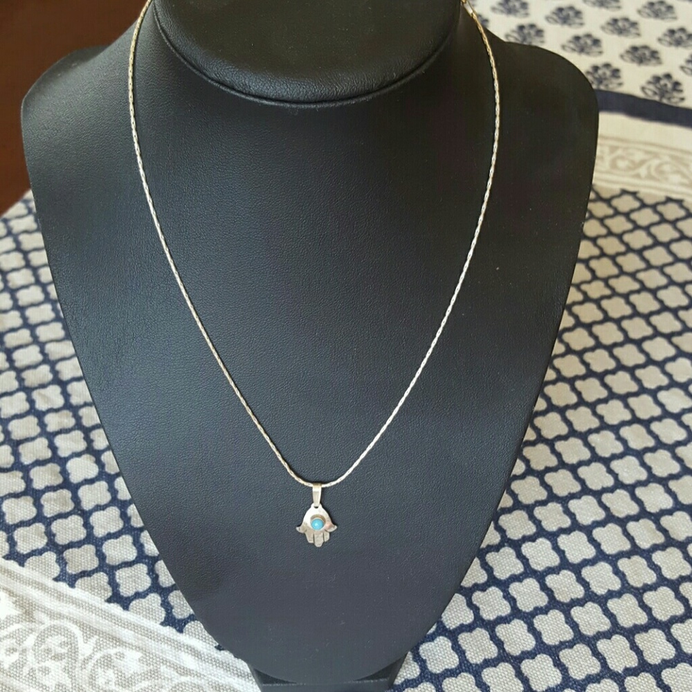 Sterling silver necklace with blue stone