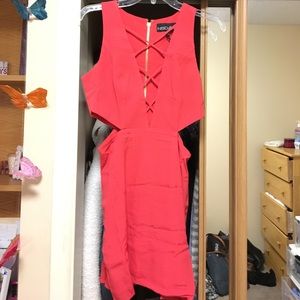 A brand new red cut out dress from Revolve website