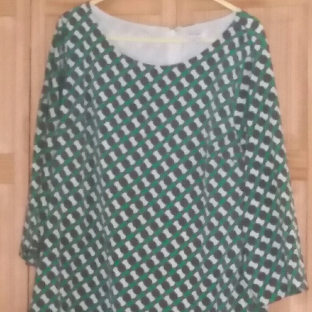 Retro,  60's era, swing dress. ..great with boots!