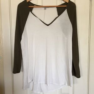 White and olive green t shirt.