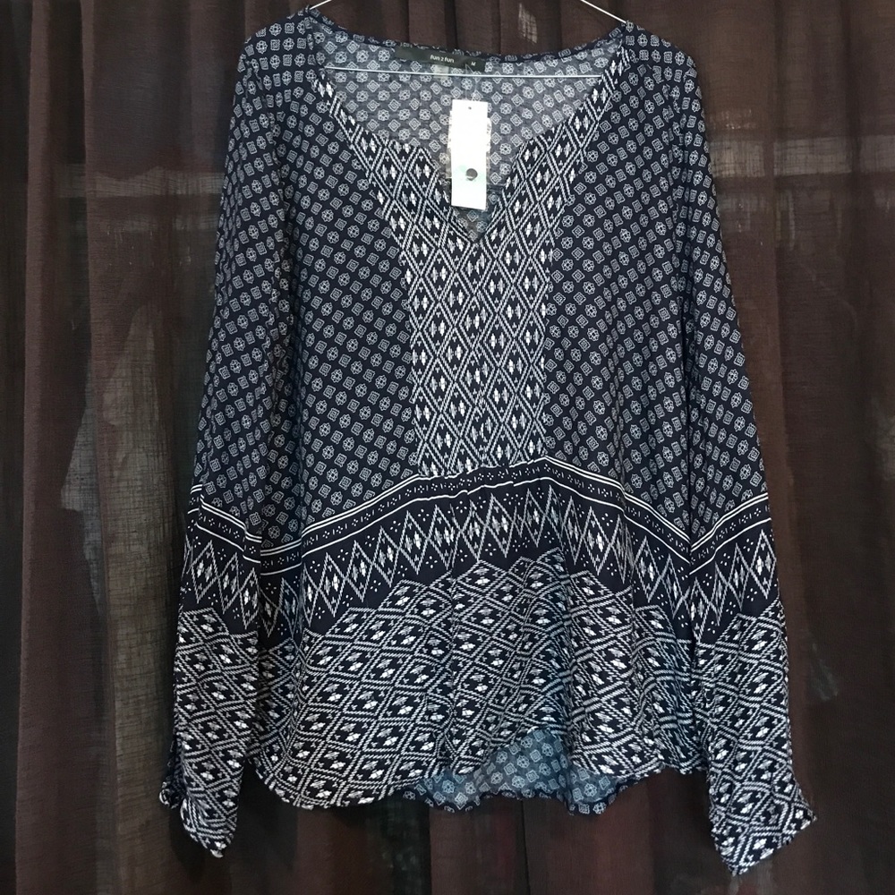 Navy long sleeve shirt, still has tags.