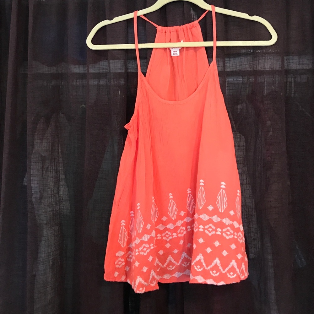 Orange tank top, tags still on