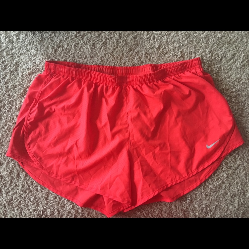Red Nike running shorts