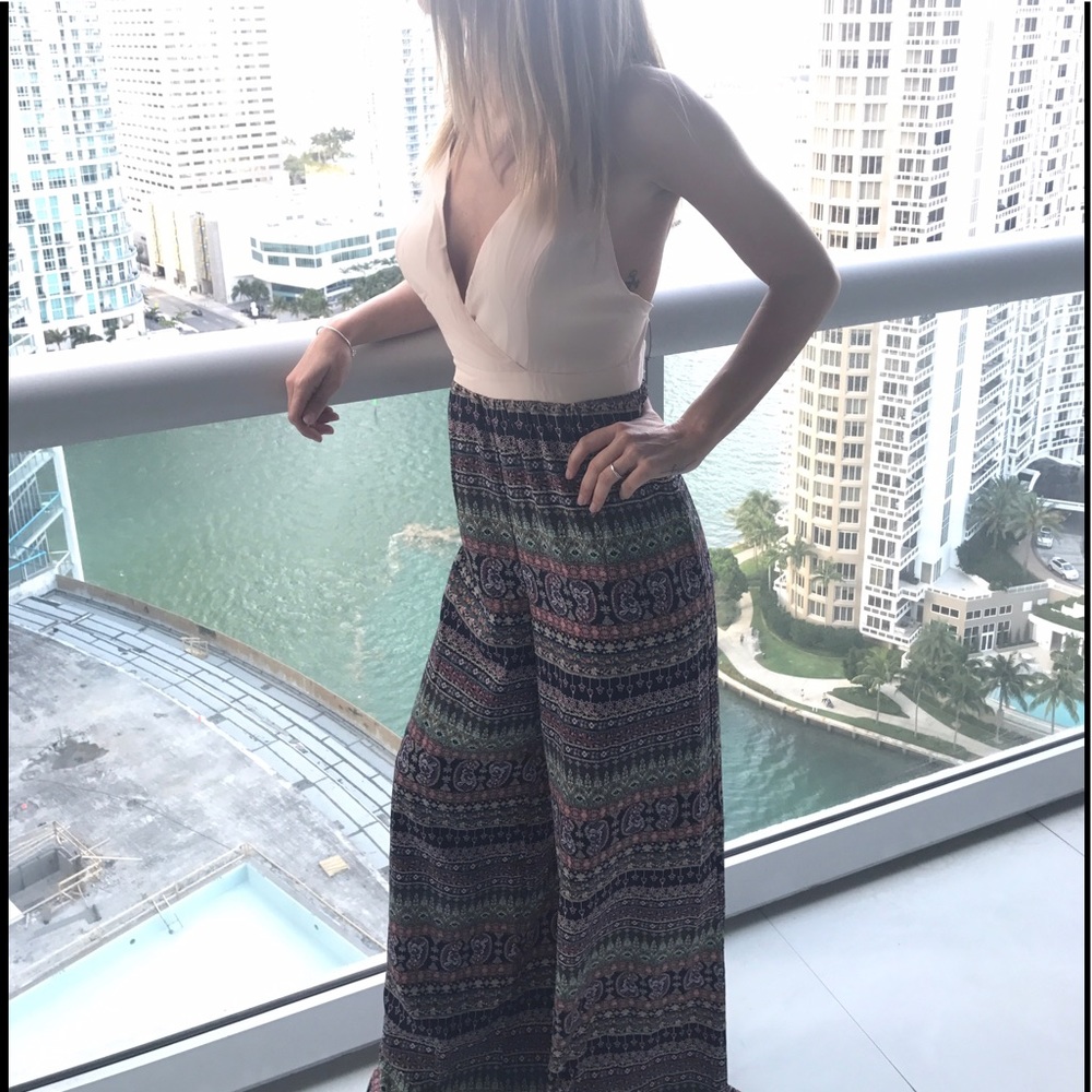 Beige romper size small sexy pattern design