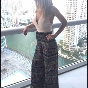 Beige romper size small sexy pattern design