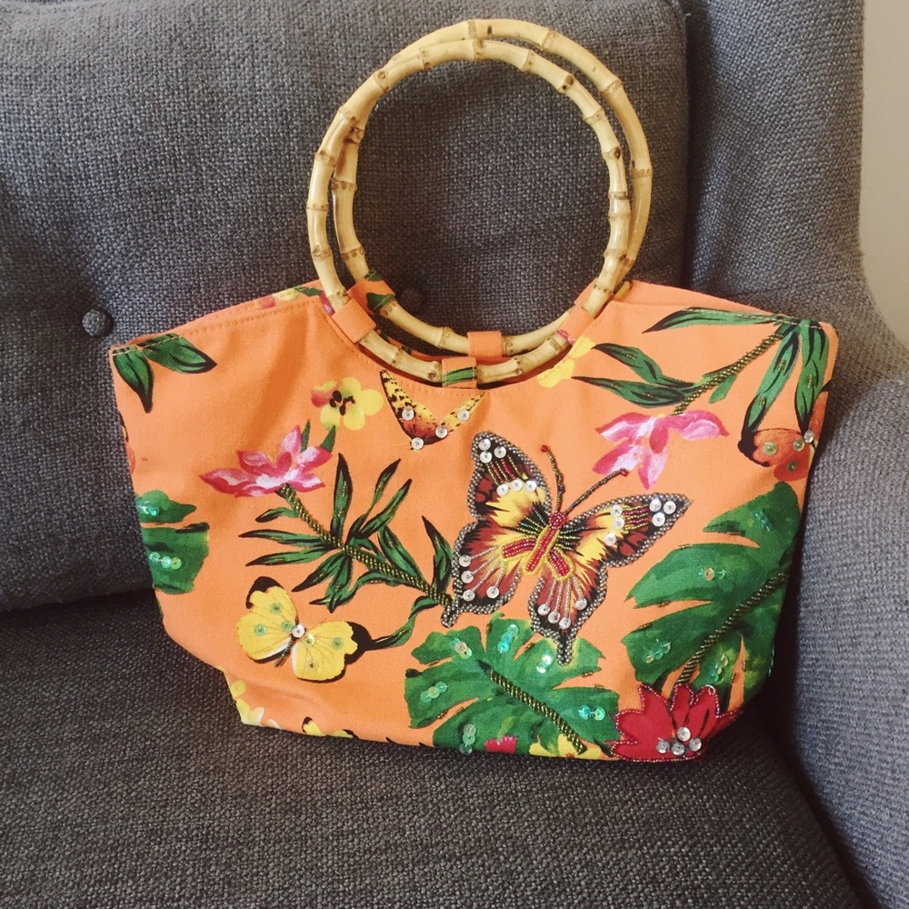 Pretty beaded butterfly bag with round handles