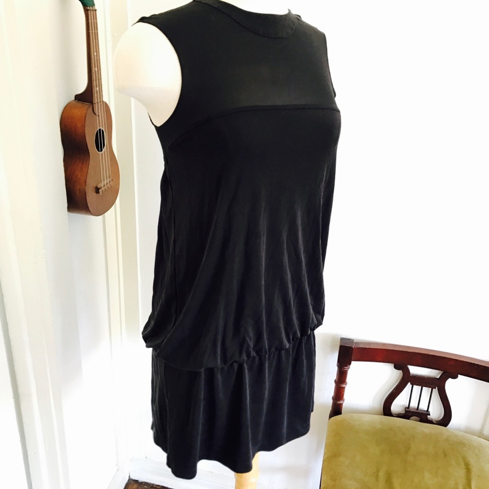 Black sleeveless mod mini dress