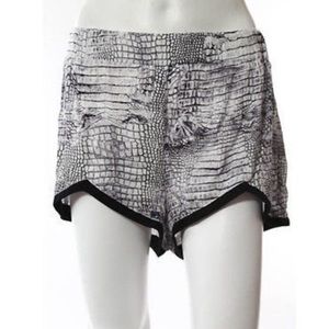 LF/Indikah snakeskin print black trim shorts