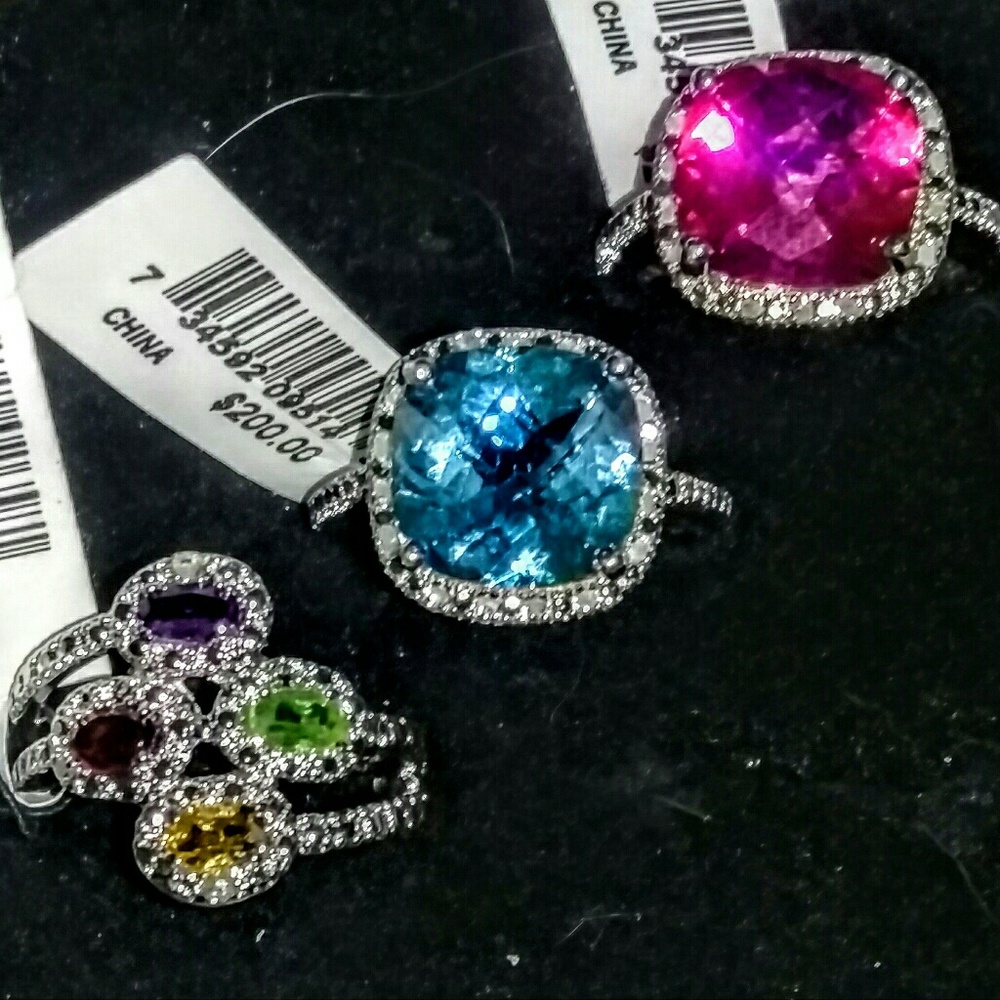 Rings each with genuine diamonds on Sterling 925