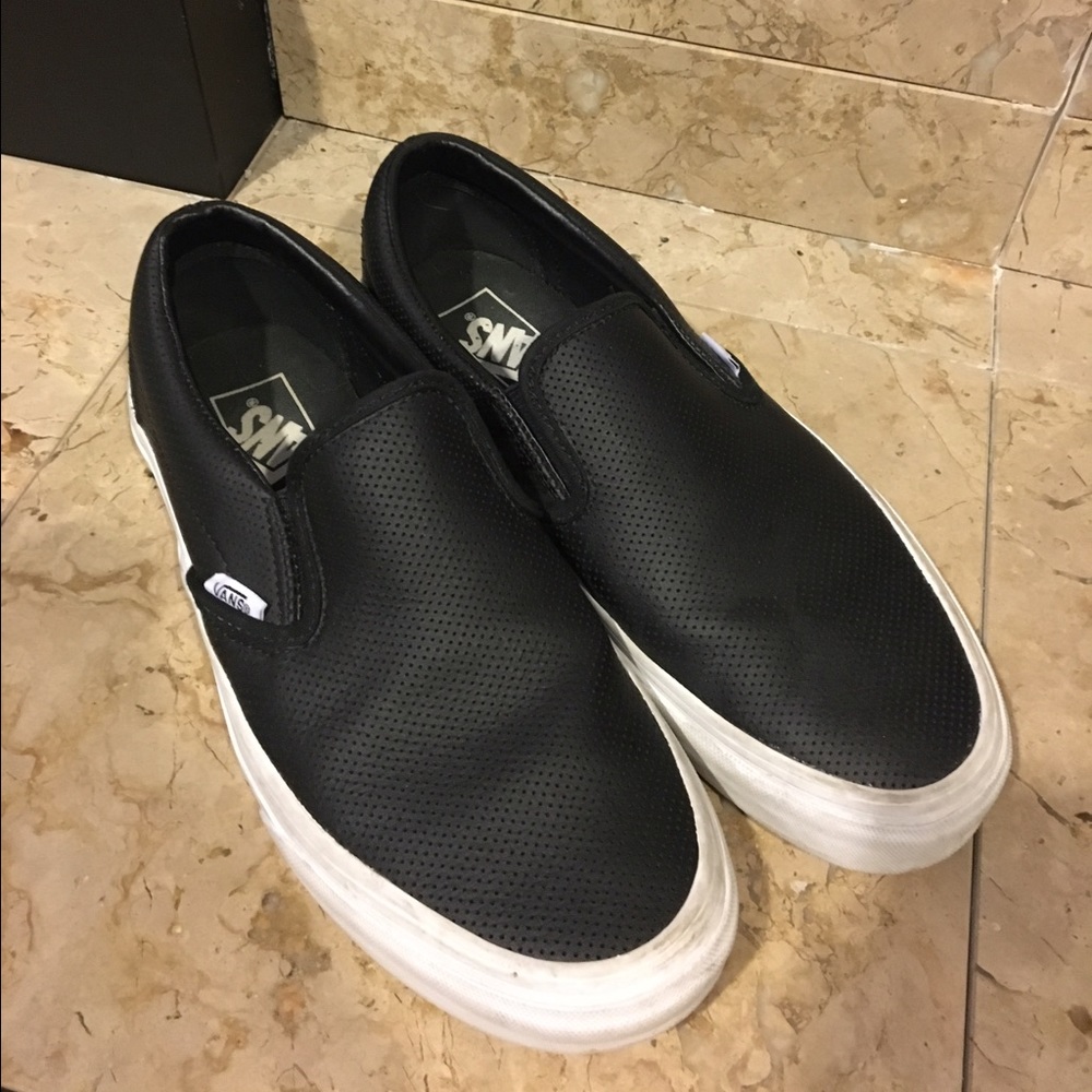 Black perforated vans