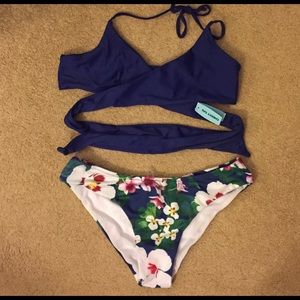 Size medium swimsuit. Never worn. Tags still on.