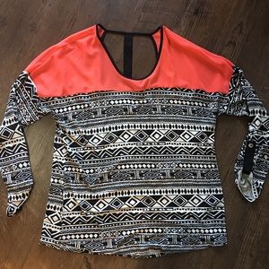 Fun coral, black and white patterned blouse