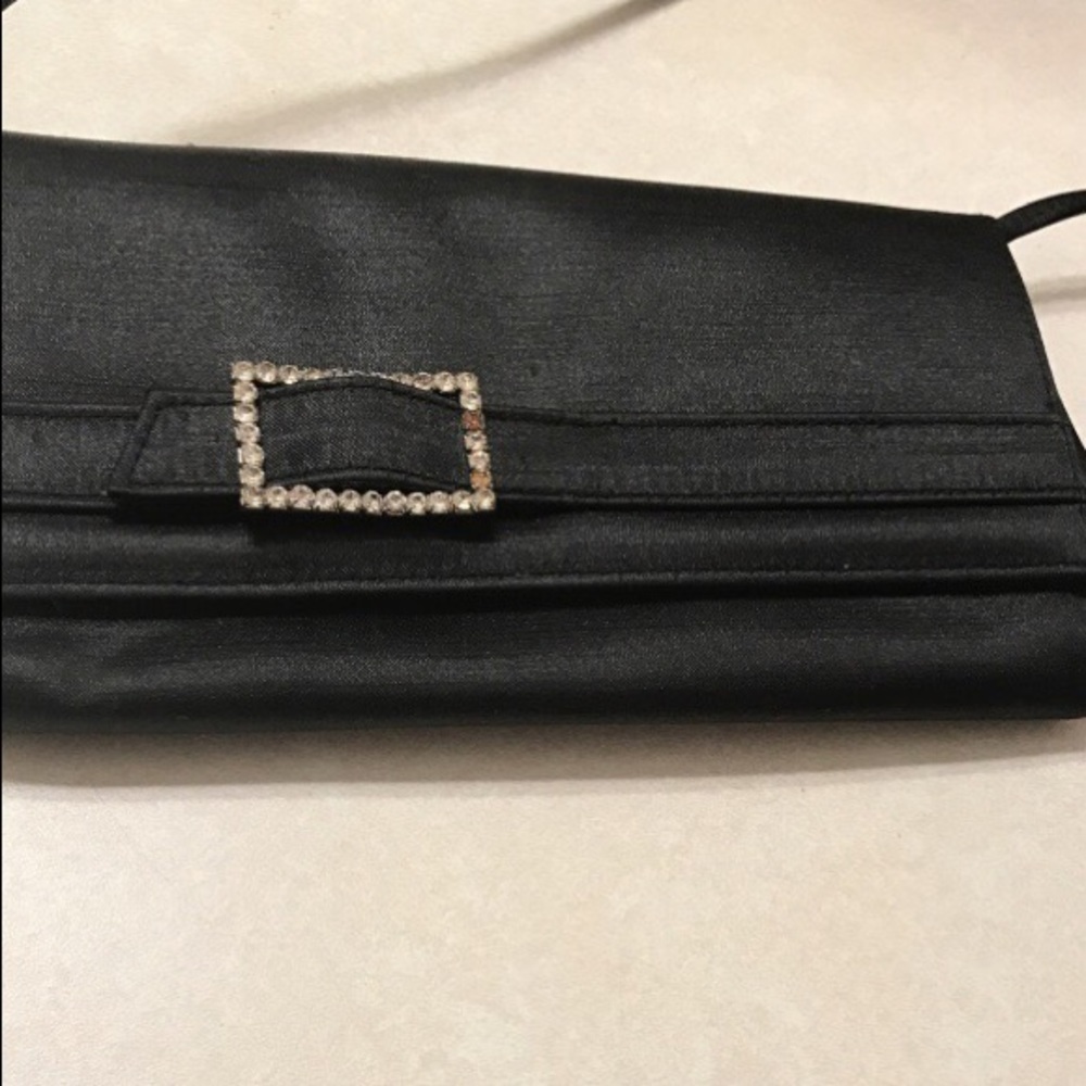 Black and silver sling bag
