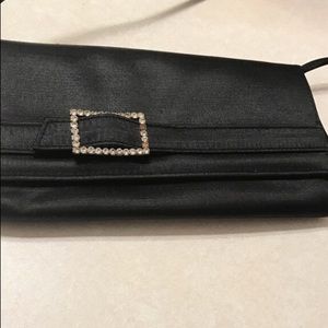 Black and silver sling bag