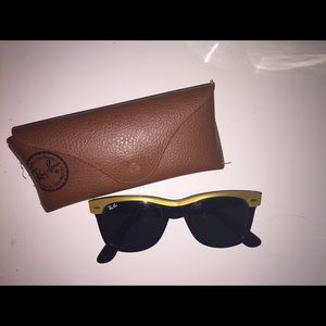 Black and gold Ray-Ban wayfarer