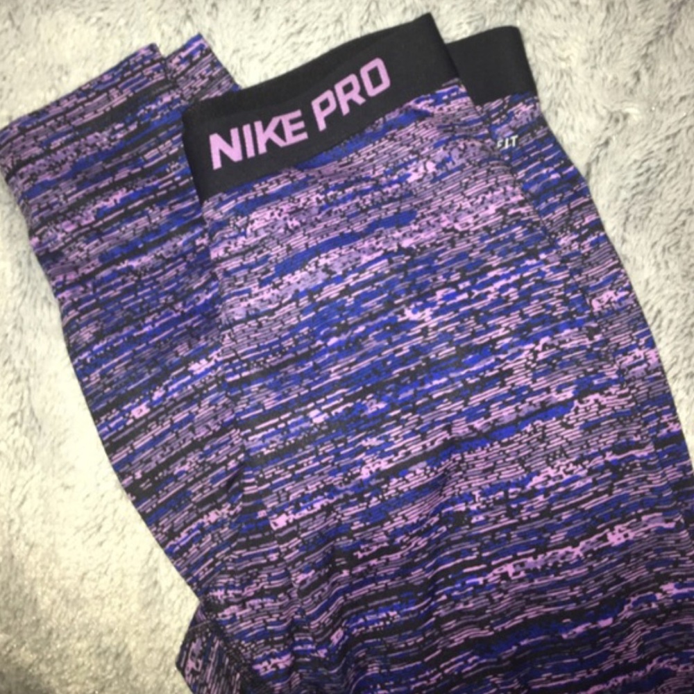 Lrg, tight fitting blue and purple Nike Pro