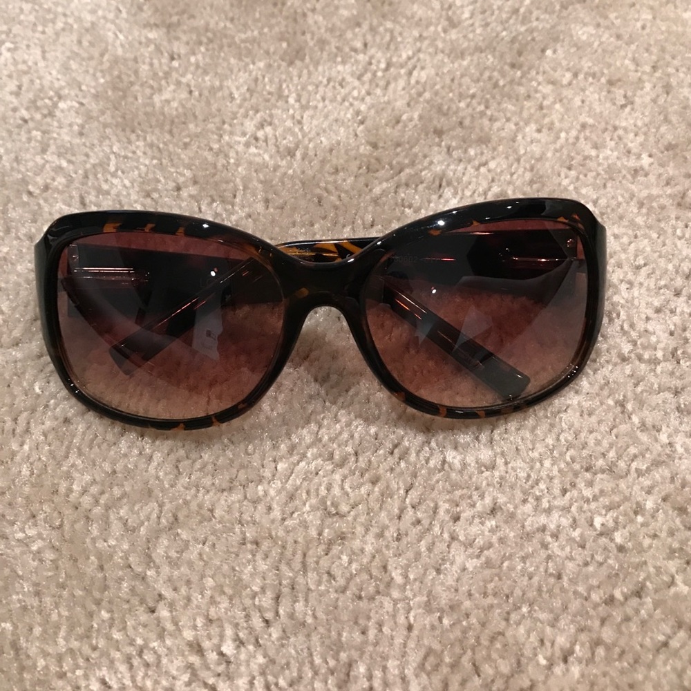 1 pairof Loft sunglasses