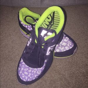 Reflective cheetah Nike shoes