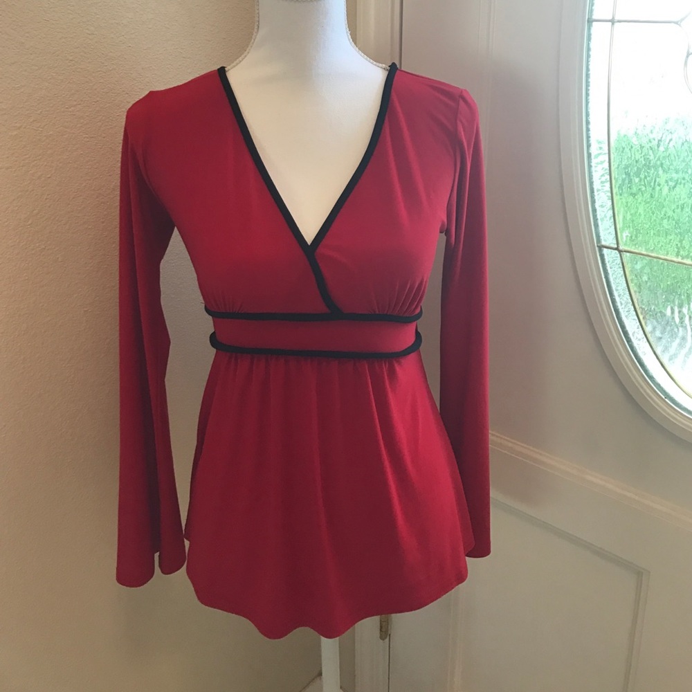 Adorable red shirt with tie in back. Size M