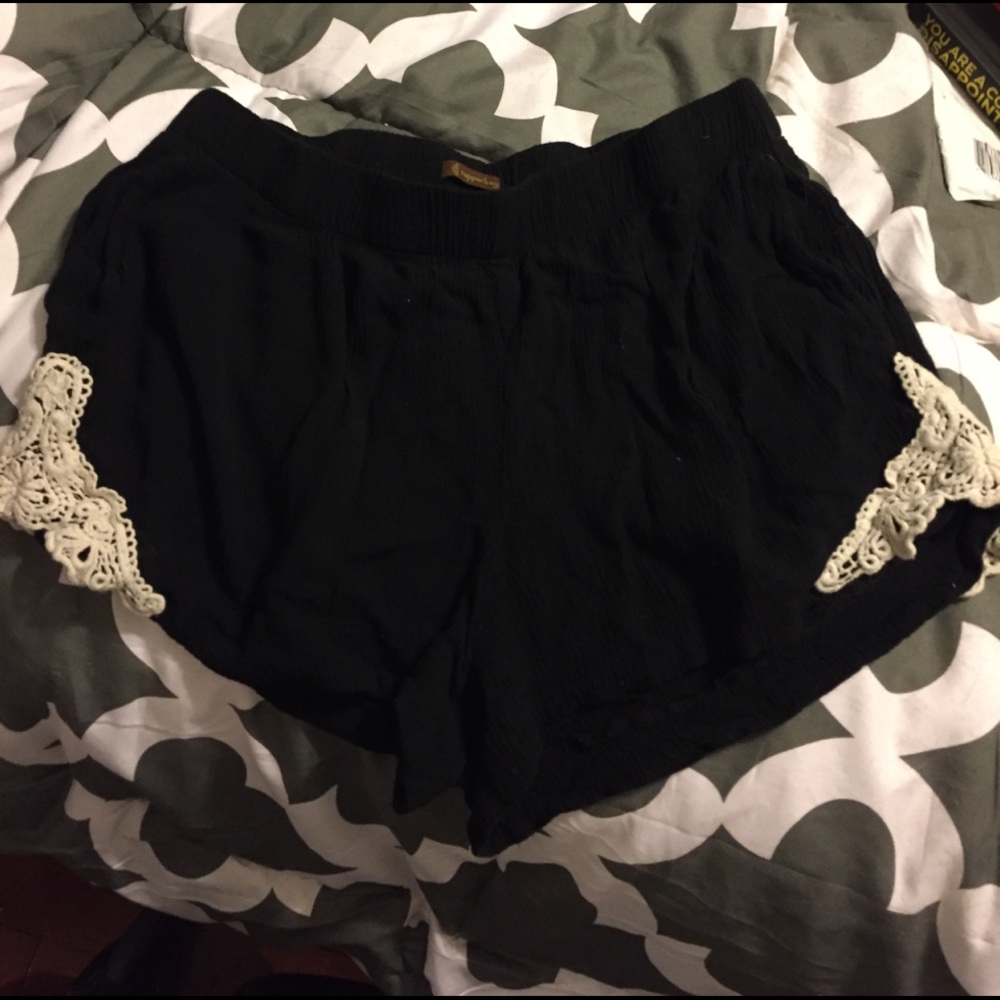 NWOT loose fitting black shorts w/ lace detail