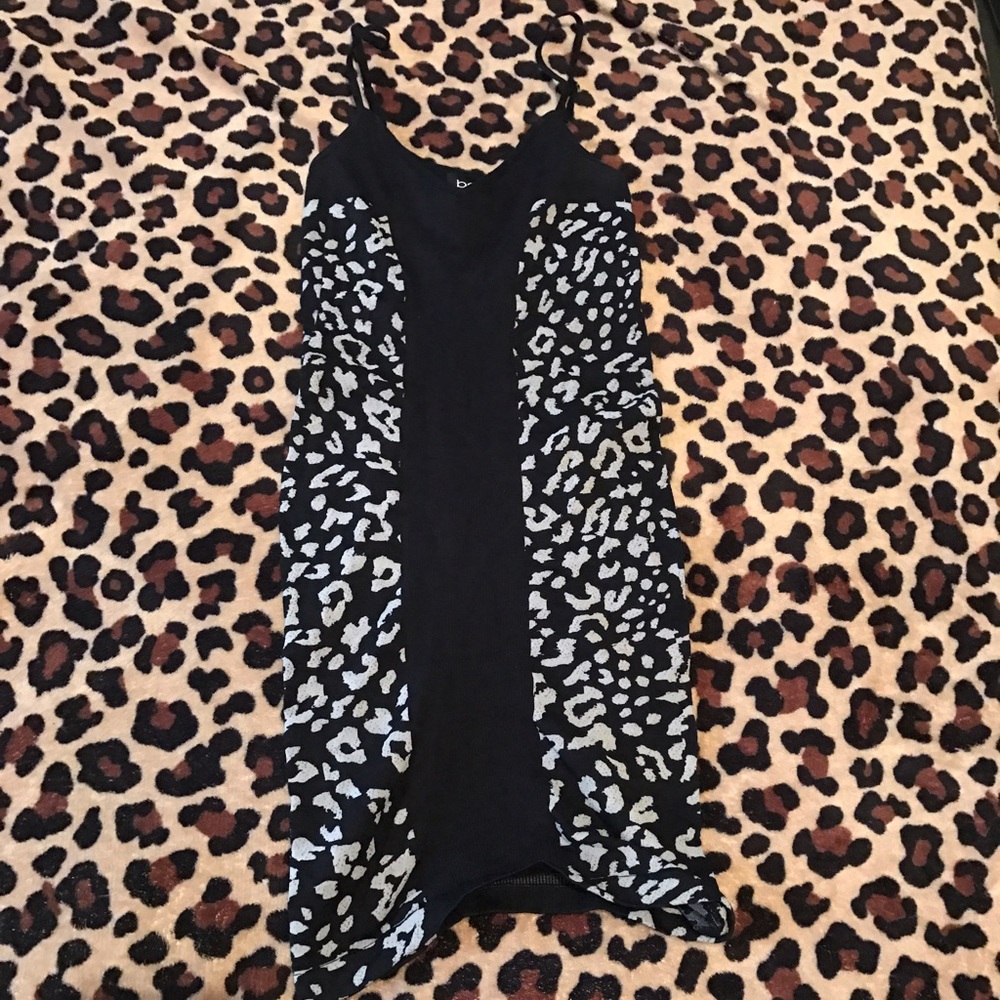 Small Bebe Dress with adjustable straps.