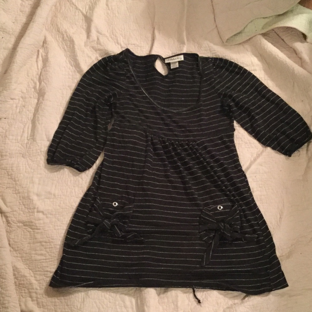 Long black and silver long sleeved blouse.