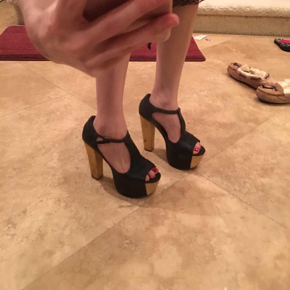 High but easy to walk. Leather upper and inside.