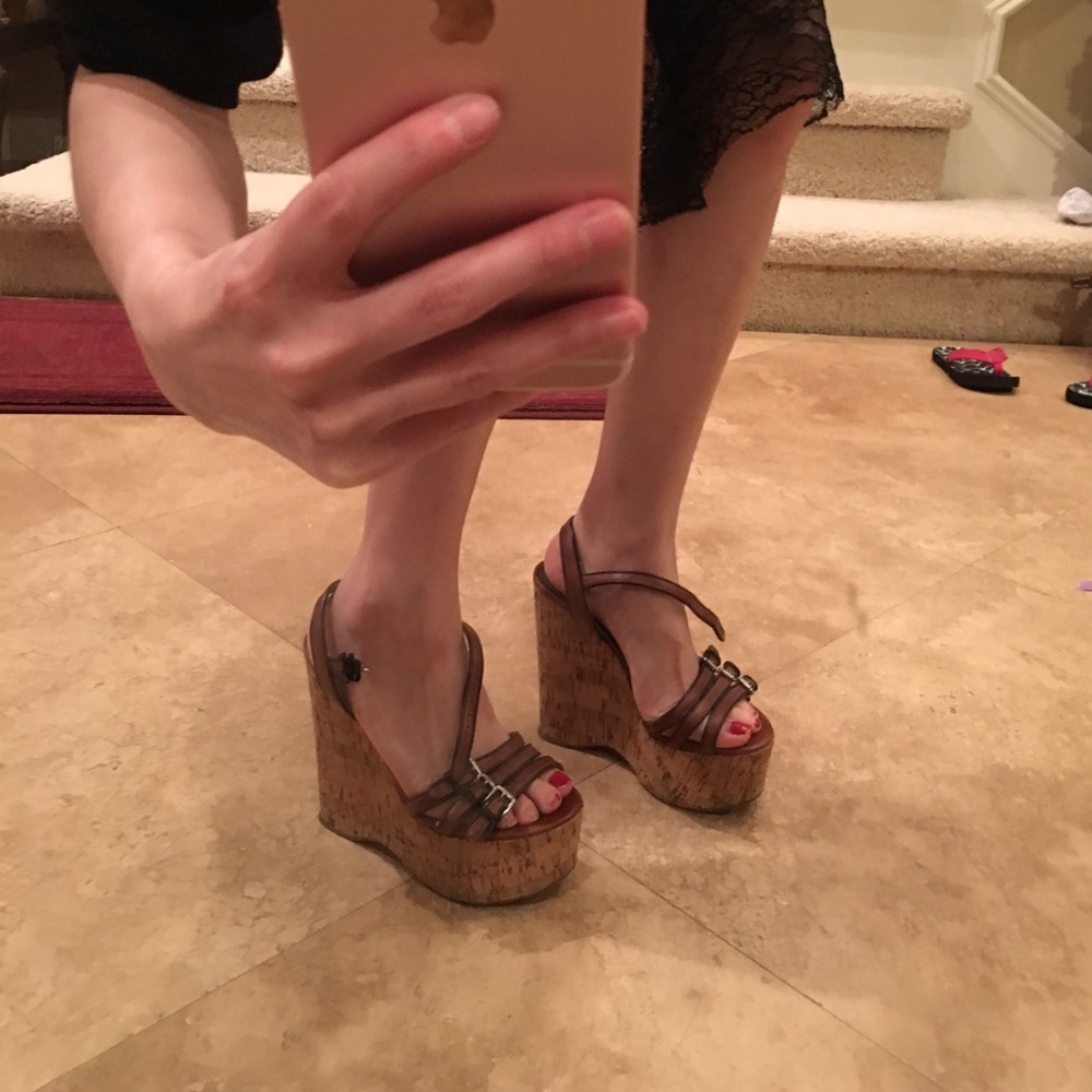MK  leather wedge. Buckle is not adjustable.