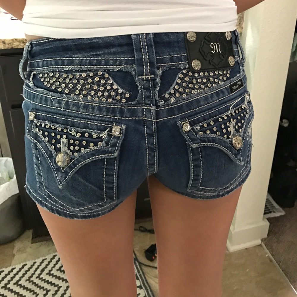 A dark wash pair of miss me shorts