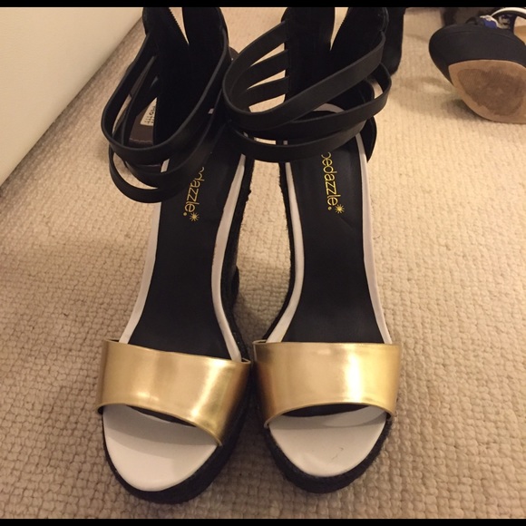 Shoe Dazzle Shoes - 5 inch wedges. Gold black and white. Never worn