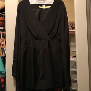 Black, long sleeves romper, size 8.
