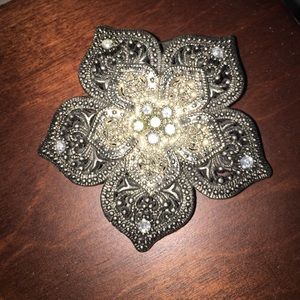 Flower belt buckle.