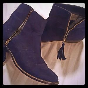 Suede booties with tassel zipper