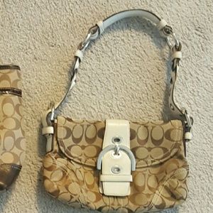 Tan and white small coach bag