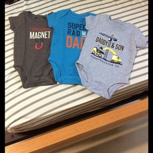 3 onesies all brand new and never worn